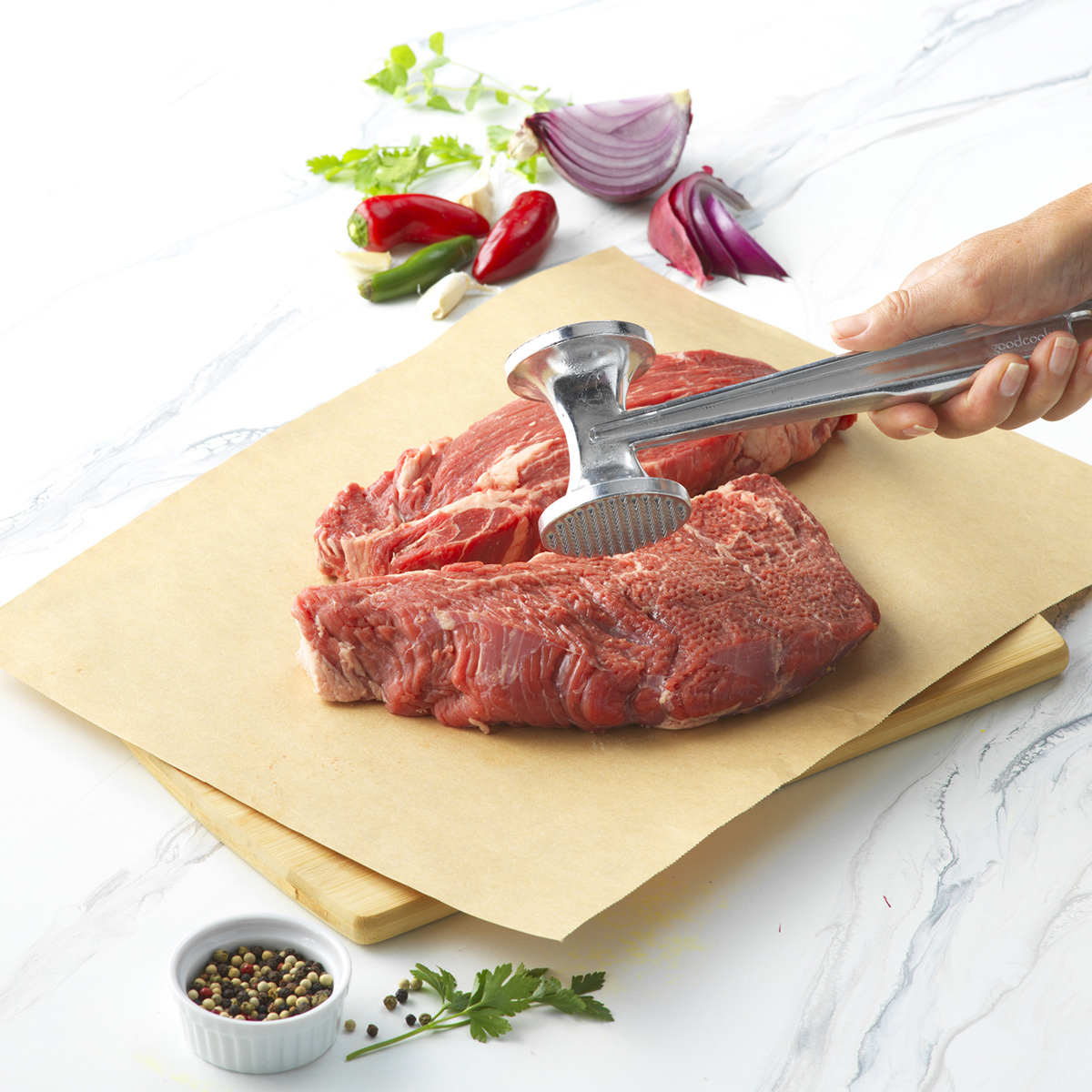 https://www.goodcook.com/media/catalog/product/2/0/20016_goodcook_two-sided_meat_tenderizer_lifestyle.jpg?auto=webp&format=pjpg
